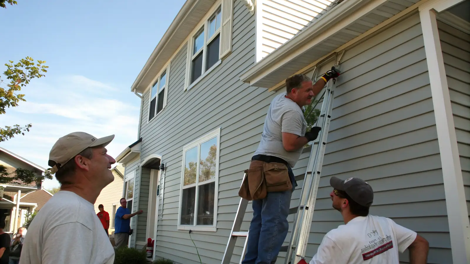 Siding pro at work on a home project